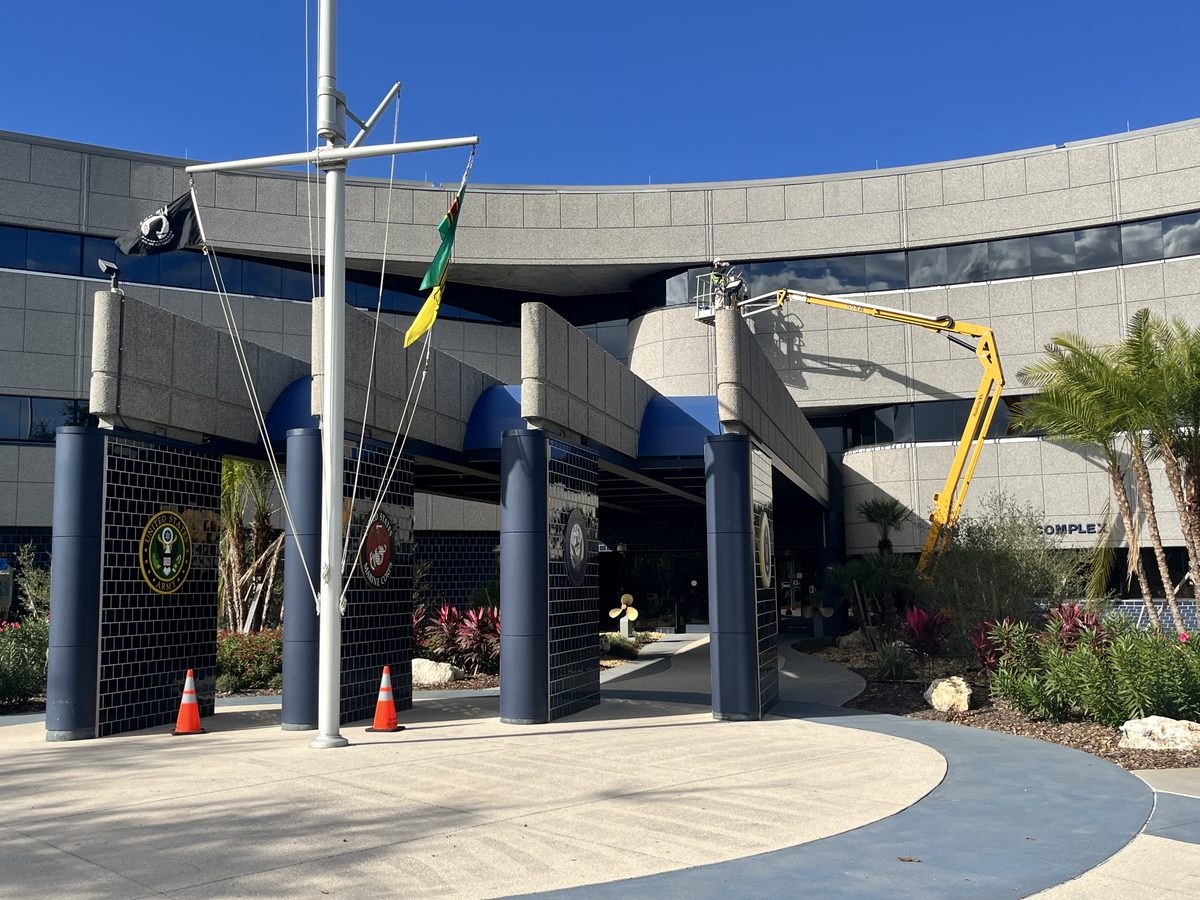 Government facility painting with boom lift